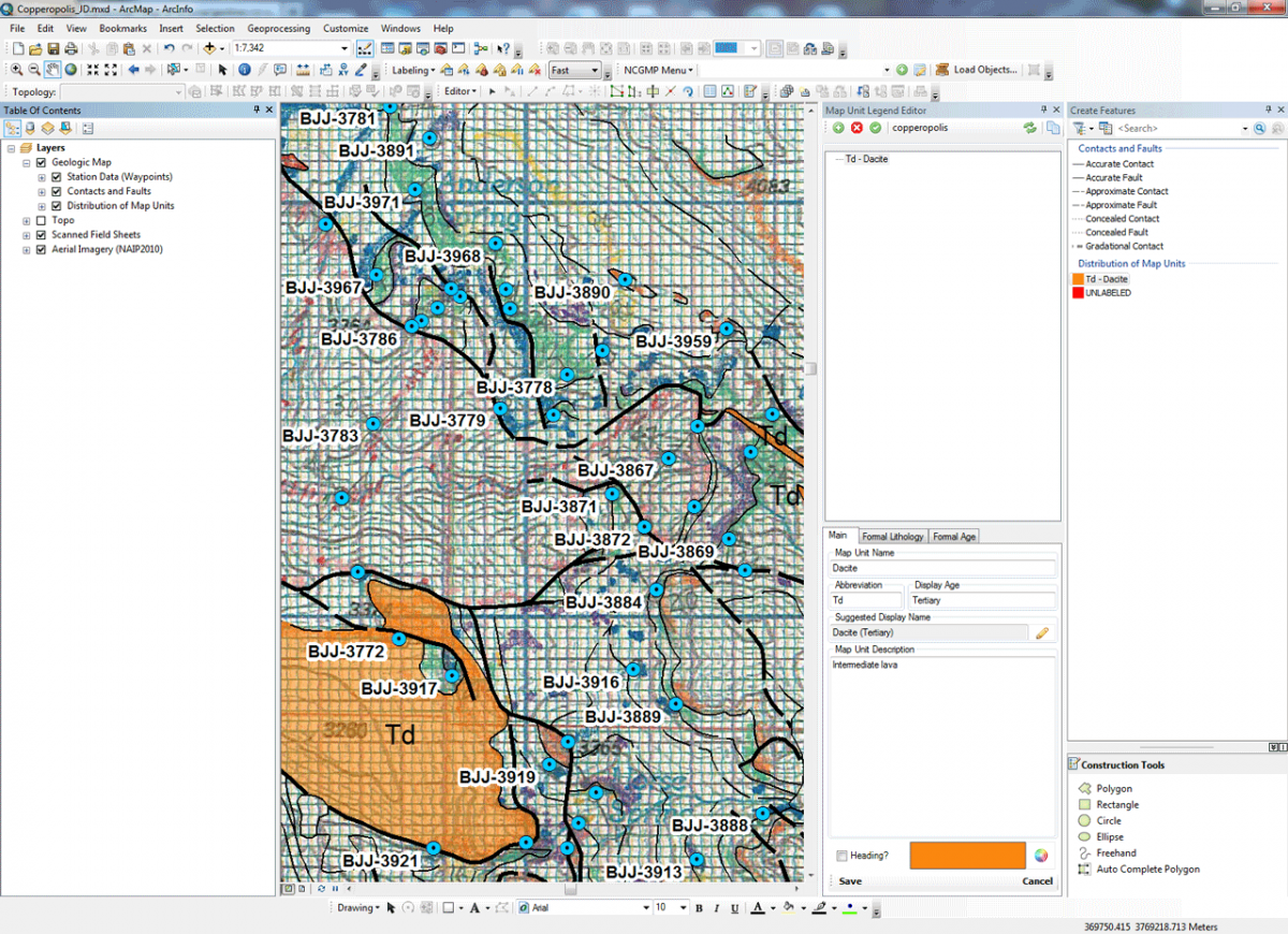 Scanned field sheet in ArcMap. Black lines represent contacts, orange area represents dacite – a volcanic rock - and labeled blue dots represent waypoints.